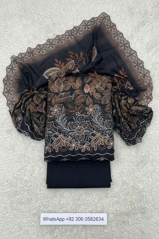Black and brown leaf print Danak suit fabric with embroidered dupatta detail
