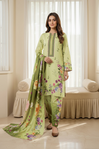 Model wearing pistachio green Karandi printed 3-piece unstitched suit